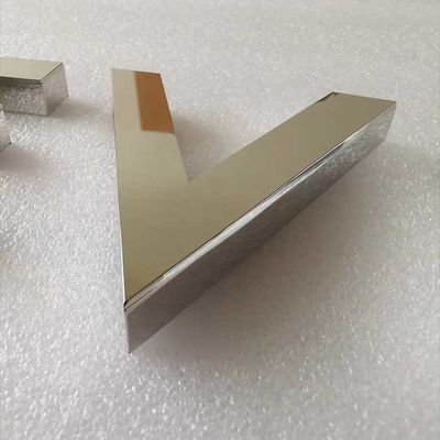 Mirror-polished stainless letters, hand-finished.